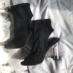 Black suede heels with clear heel